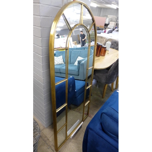 1465 - A large gold arched mirror