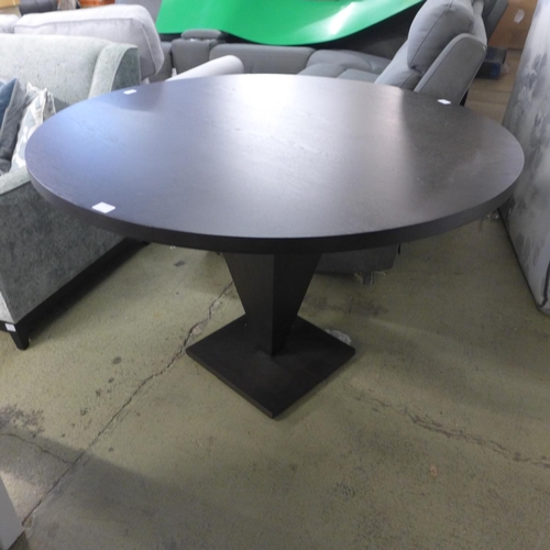 1560 - A black pedestal dining table