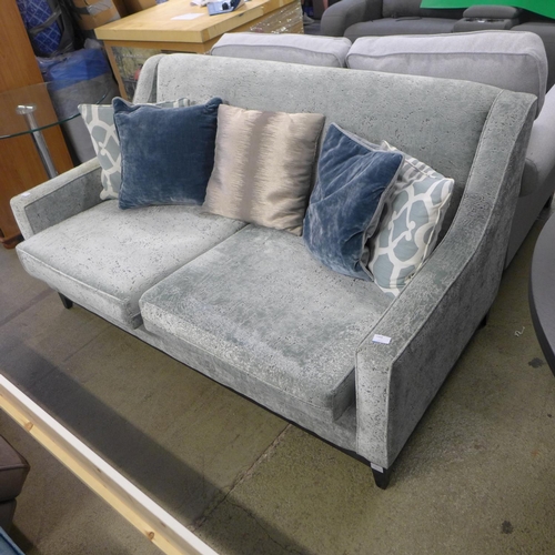 1569 - A silver/blue crushed velvet 2.5 seater sofa on semi-exposed frame