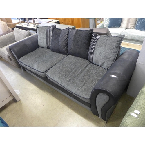 1593 - A black and grey upholstered four seater sofa