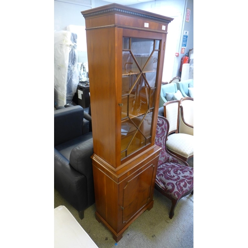 1604 - A stained oak display cabinet