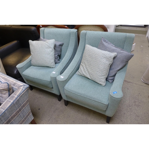 1615 - A pair of blue textured weave side chairs with patterned scatter cushions