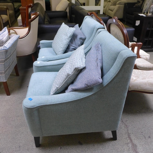 1615 - A pair of blue textured weave side chairs with patterned scatter cushions