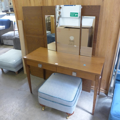 1619 - A stained oak effect dressing table, headboard and an upholstered footstool