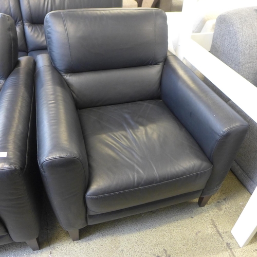 1628 - A black leather three seater, two seater, armchair and footstool