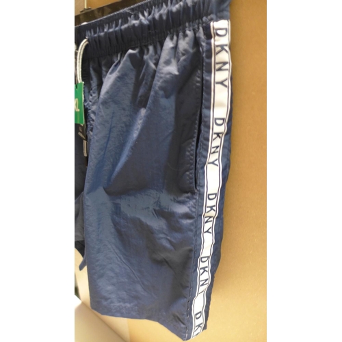 3180 - 2 Pairs of men's DKNY swim shorts - sizes: L & XL * this lot is subject to VAT