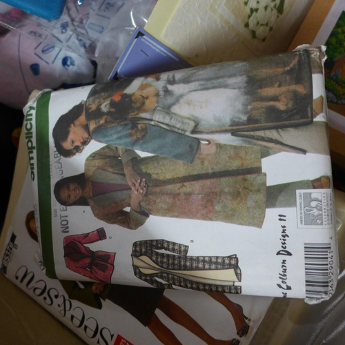 2296 - Box of sewing patterns and wool