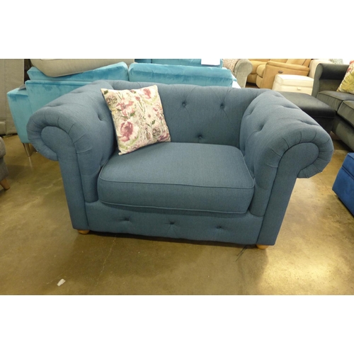 1437 - A navy blue textured weave Chesterfield style three seater sofa and loveseat