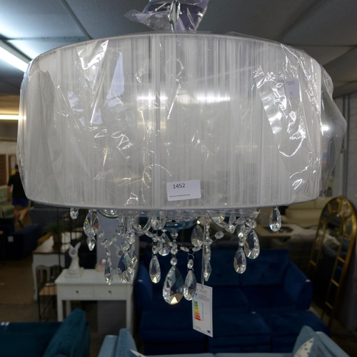 1452 - A chrome five arm chandelier with white shade