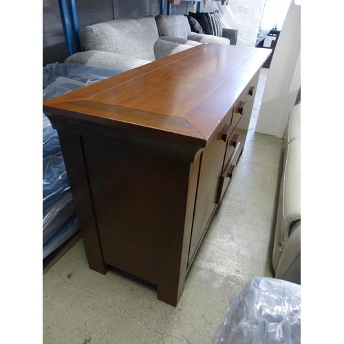 1633 - A hardwood three drawer, two door sideboard - marked