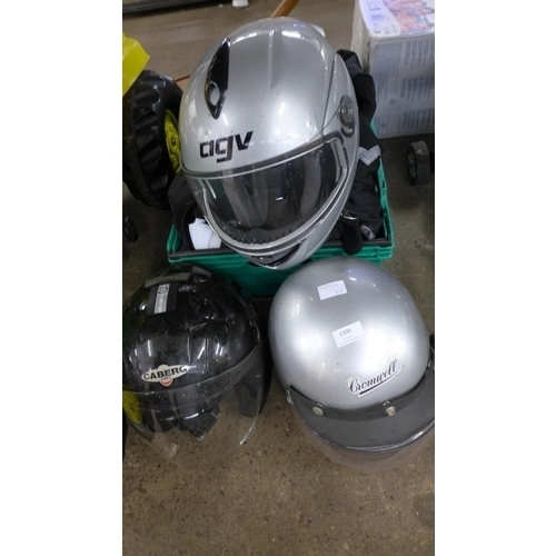 2300 - Four motorcycle helmets and matching set of Scotchlite riding gear (jacket and trousers)