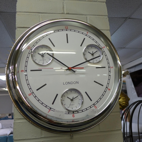 1395A - A chrome convex multi dial clock