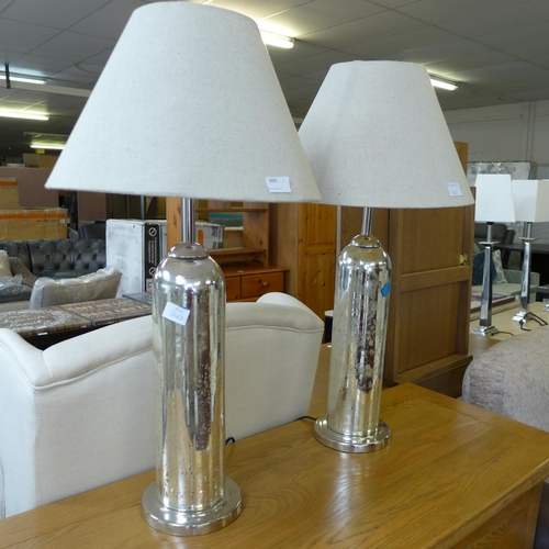 1605 - A pair of silver glass lamps with oatmeal shades