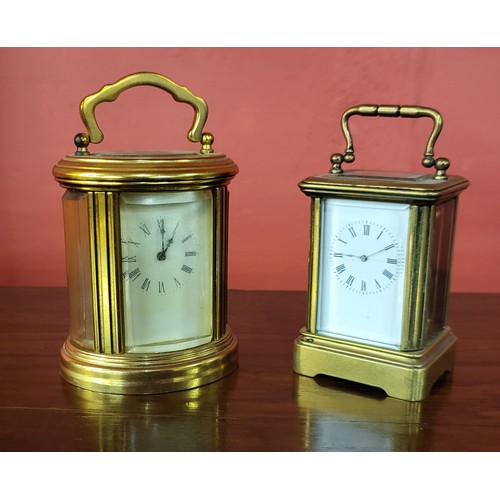 76A - Two miniature French brass carriage timepieces