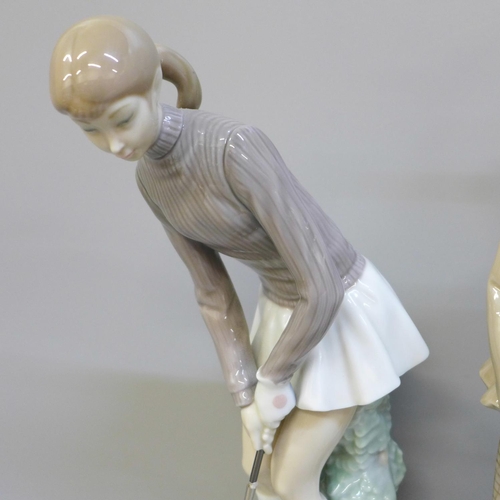 618 - Two Lladro figures of golfers, girl's golf club a/f