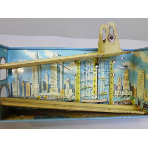 620 - A Technofix tin plate clockwork diorama 266 Twin Car Elevator