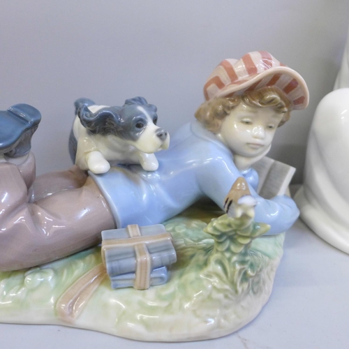 629 - Two Lladro figures of children with dogs, one with bird a/f (feathers)