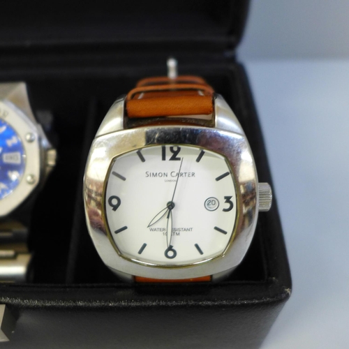 630 - Three gentleman's wristwatches in display case