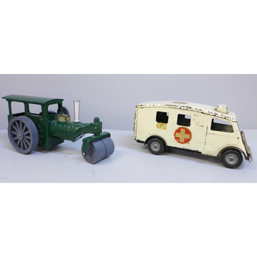 638 - A Tri-ang tin plate Minimatic clockwork Ambulance and a Tri-ang Minic clockwork Oscillating Steam Ro... 