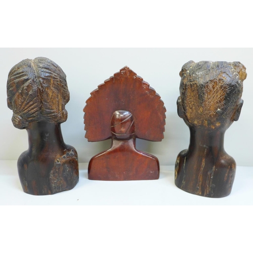 651 - Three carved hardwood busts; two African and one South East Asian