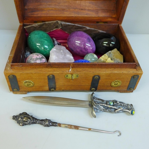 662 - A collection of mineral samples, a letter opener and a button hook