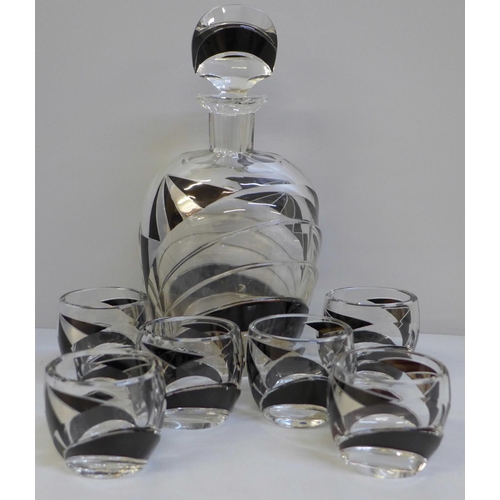 682 - An Art Deco crystal decanter and six glasses