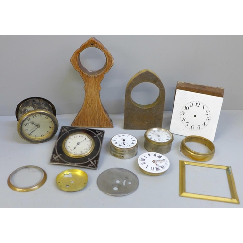 687 - A tortoiseshell mounted clock, a/f and clock movements, etc.