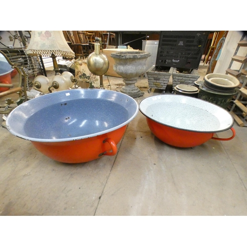 357 - Two large orange enamelled bowls