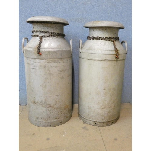 366 - A pair of vintage galvanised milk churns