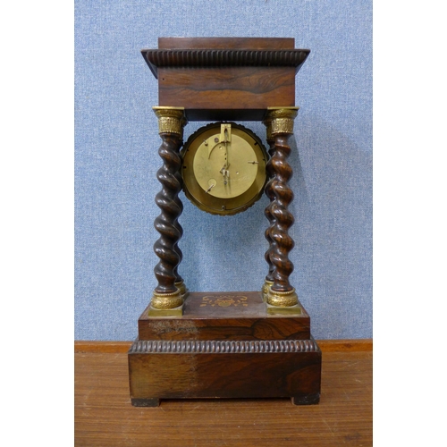 78 - A 19th Century French marquetry inlaid rosewood and parcel gilt portico clock