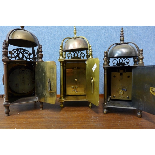 81 - Two French brass lantern clocks and one other