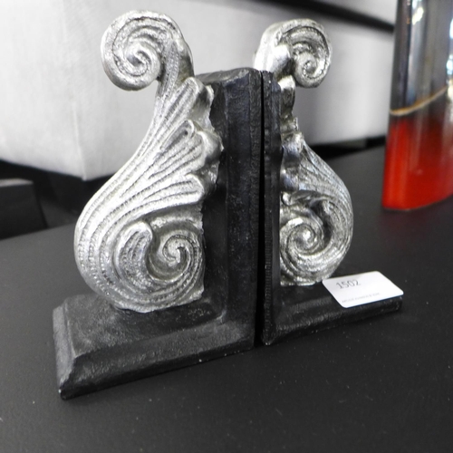 1495 - A pair of black and silver bookends