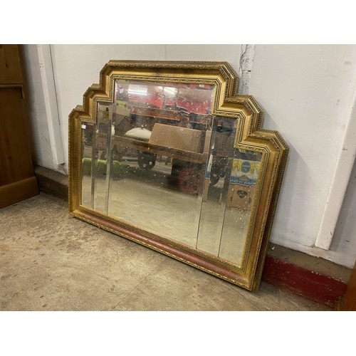 63B - An Art Deco style gilt framed mirror