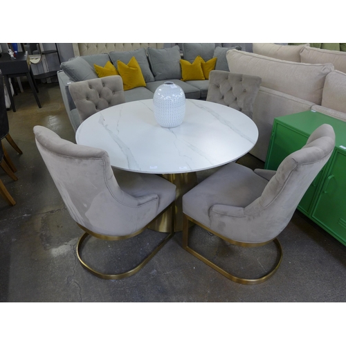 1485 - An Orbit 1.2m diameter dining table and a set of four taupe velvet button backed dining chairs with ... 