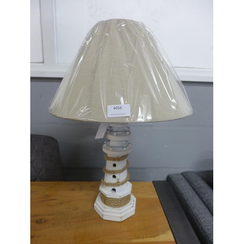 1335 - A lighthouse table lamp with cream shade H50cm (789618)