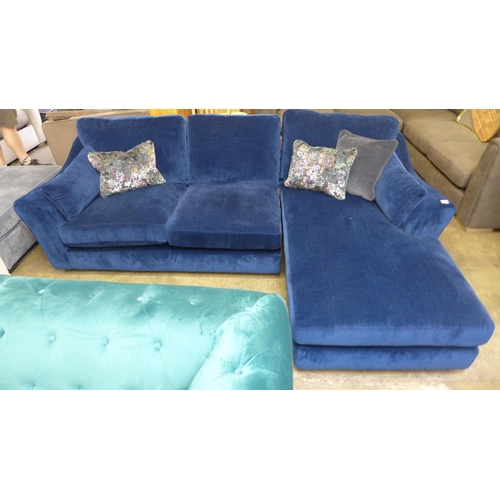 1379 - A deep blue velvet RHF corner sofa/chaise with patterned scatter cushions - damaged spring