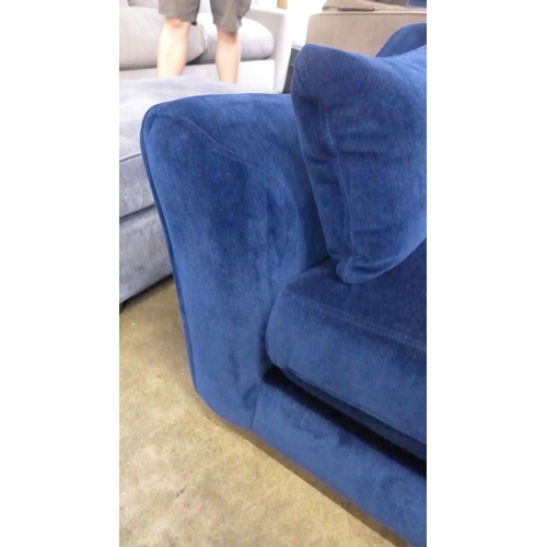 1379 - A deep blue velvet RHF corner sofa/chaise with patterned scatter cushions - damaged spring