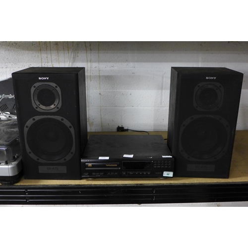 2163 - A Sony CDP-M302 compact disc player and two Sony SS-A70E speakers