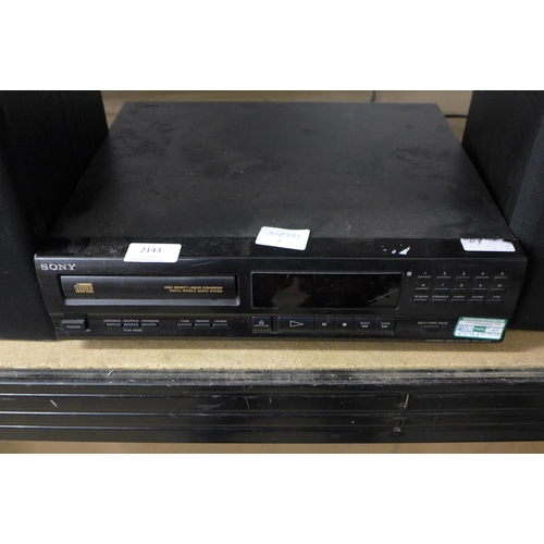 2163 - A Sony CDP-M302 compact disc player and two Sony SS-A70E speakers