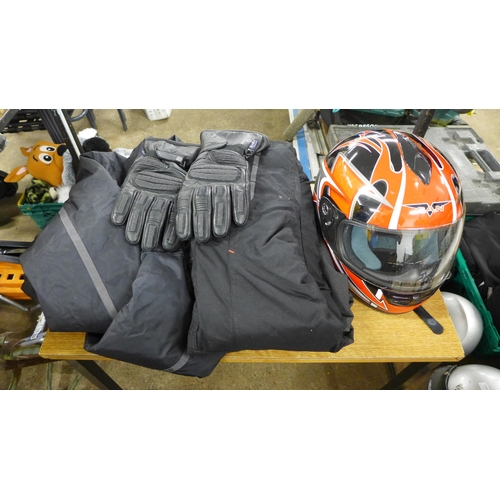 2337 - A box of motorbike clothing and helmet