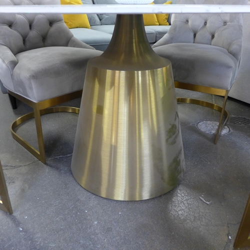 1408 - An Orbit 1.2m diameter dining table and a set of four taupe velvet button backed dining chairs with ... 