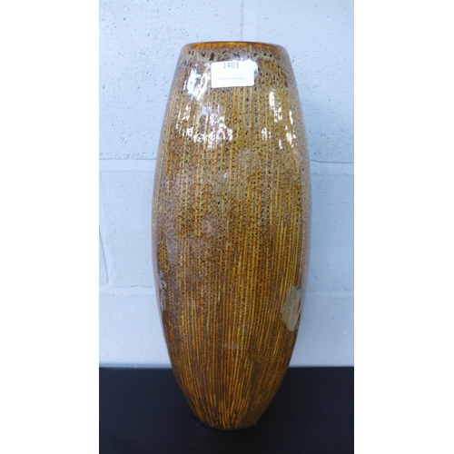 1422 - A tall ribbed vase