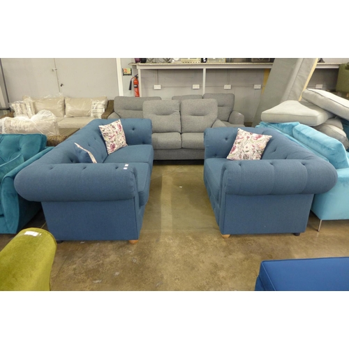 1442 - A navy blue textured weave Chesterfield style three seater sofa and loveseat