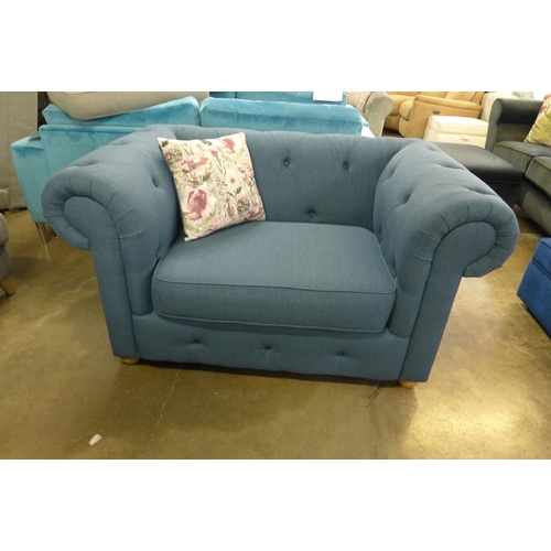 1442 - A navy blue textured weave Chesterfield style three seater sofa and loveseat