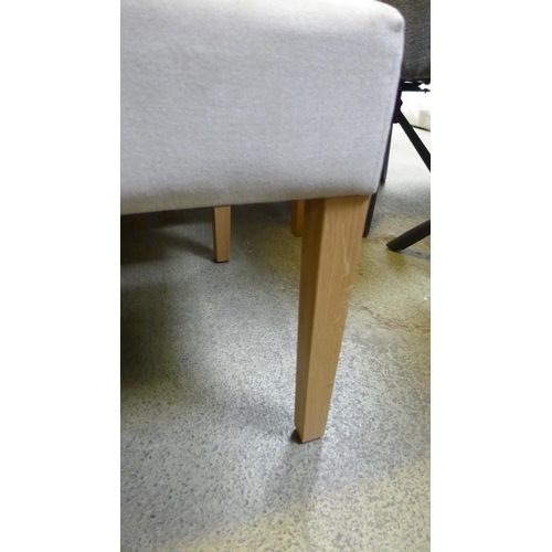 1477 - A sandstone upholstered button back corner bench group with oak legs  *this lot is subject to VAT