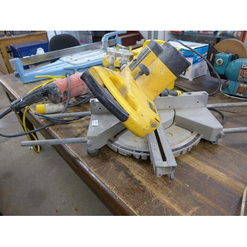 2042 - A DeWalt 1100 sliding chop saw, transformer, a Site SMA910 angle grinder  and a splitter box