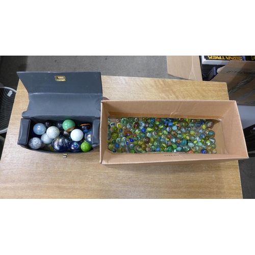 2078 - A bag of marbles and a box of marbles