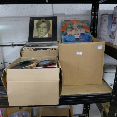 2089 - Three boxes of LPs and singles including rock and pop