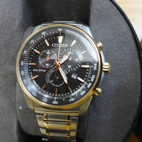 2107 - A Citizen two-tone chronograph wristwatch * this lot is subject to VAT