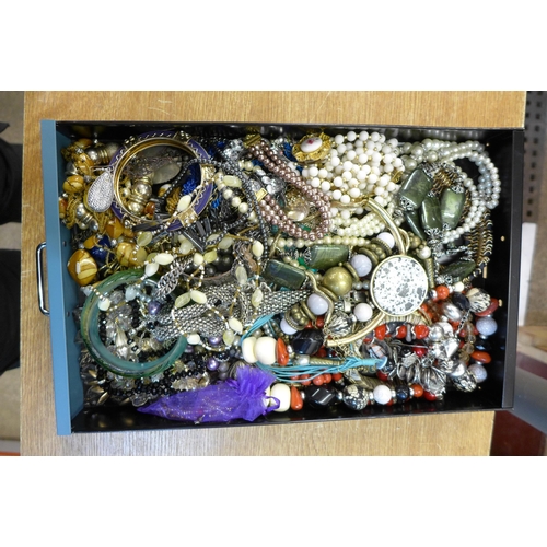 2124 - A large box of costume jewellery